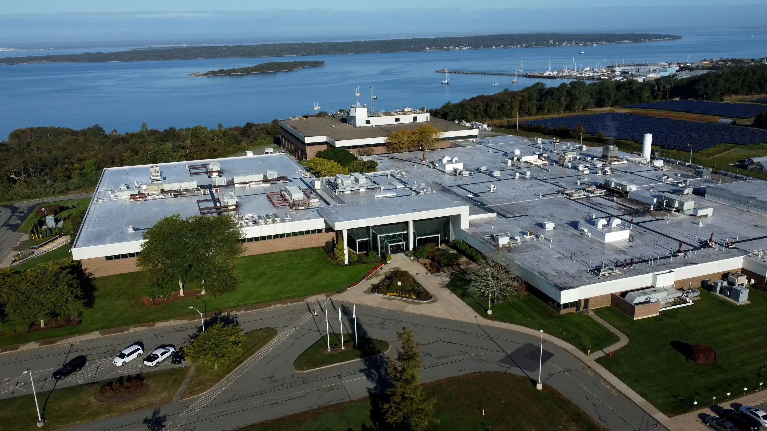 McKee administration announces $8 million in business incentives, including $6.2 million for Raytheon’s Portsmouth expansion